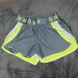 Grey and yellow Under Armor shorts